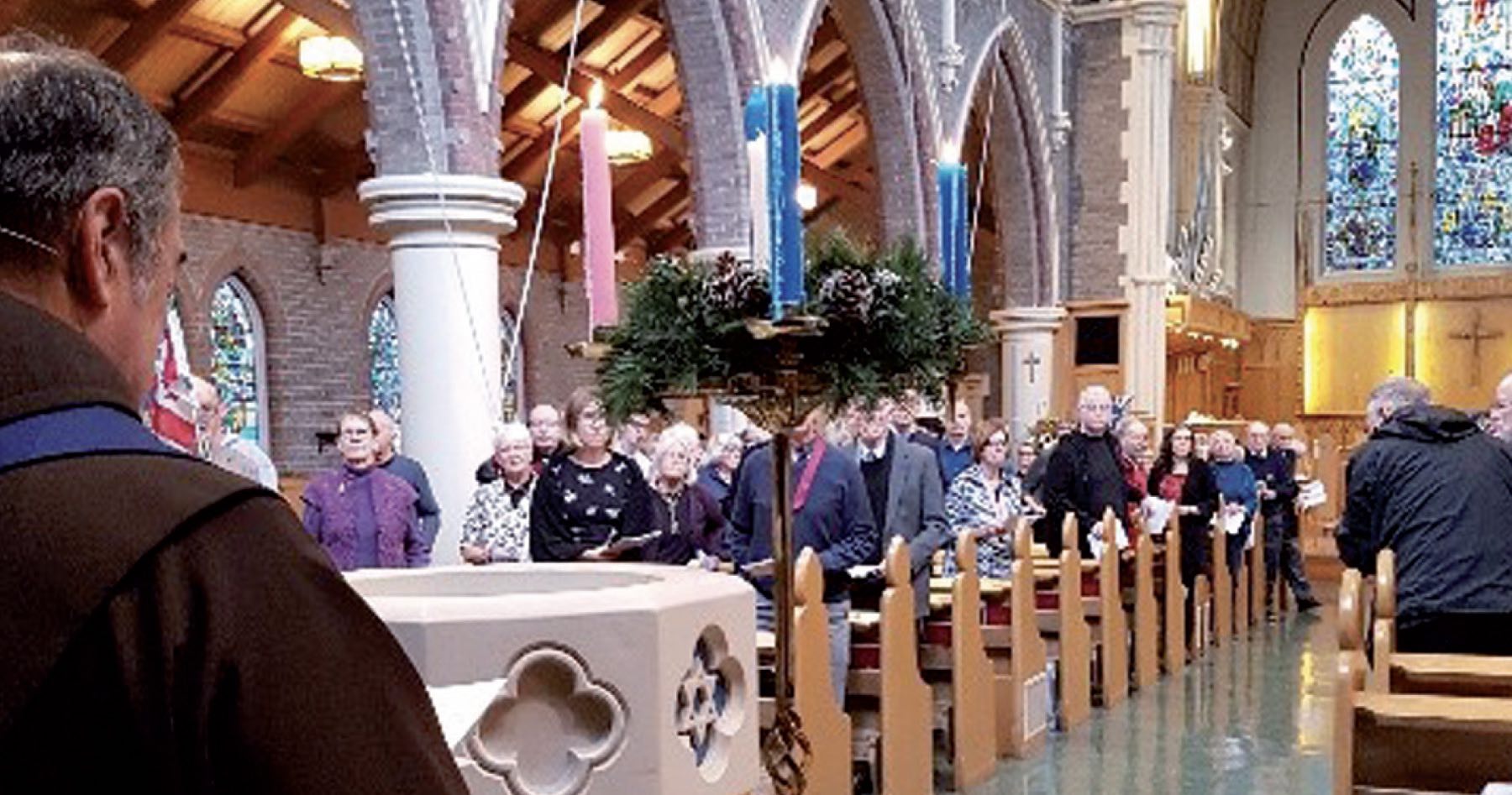 Lighting the Advent candles at St. John the Divine, Victoria. Photo by Alastair Singh-McCollu