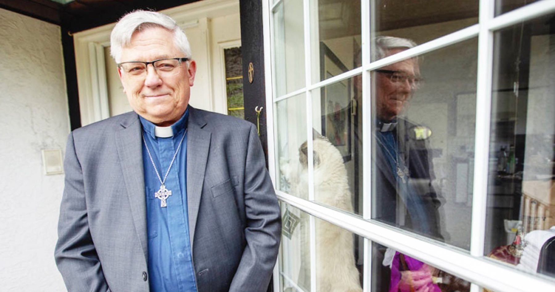 Lon Towstego, incumbent in the parish of Central Saanich, outside his home in Victoria.